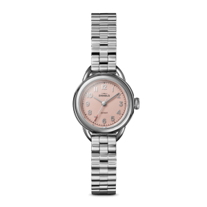 Elegant Shinola watch featuring a stainless steel case, pink dial, and stylish bracelet.
