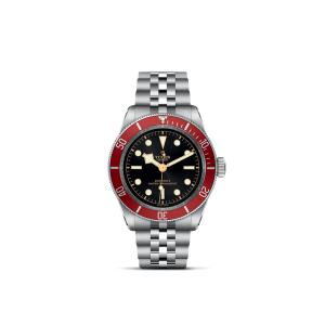 Tudor luxury dive watch with red bezel, black dial, and stainless-steel bracelet.
