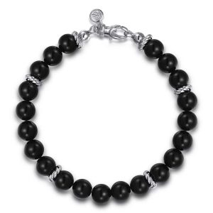 Elegant black bead bracelet with silver accents, perfect for versatile and stylish fashion.