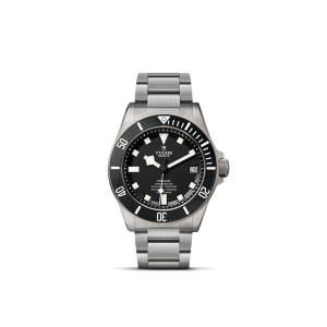 Tudor dive watch with stainless steel case, black dial, luminescent markers, and sturdy bracelet.