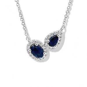 Elegant blue sapphire necklace with diamond accents in white gold or sterling silver setting.