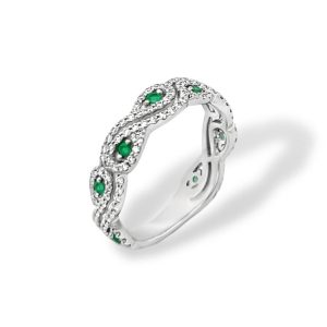 Elegant silver ring with emeralds and cubic zirconia, perfect for any occasion.