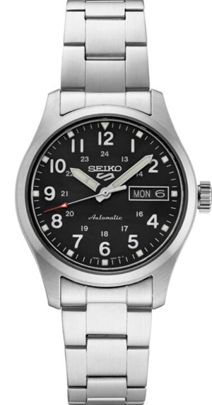 Silver-toned Seiko automatic watch with black dial, Arabic numerals, day-date display, and stainless steel bracelet.
