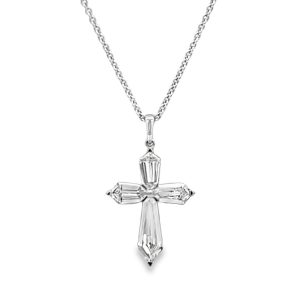 Elegant cross pendant on delicate chain, showcasing modern design and spiritual significance in fine jewelry.