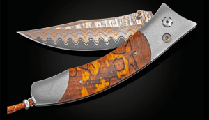 Elegant Damascus steel folding knife with a textured wood handle and intricate craftsmanship.