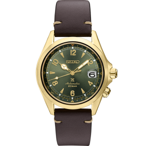 Elegant Seiko automatic watch with green dial, gold-tone case, and brown leather strap.