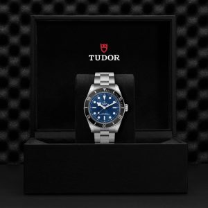 Luxury Tudor divers watch in elegant box with blue dial and stainless steel design.