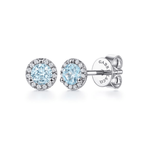 Elegant icy blue stud earrings with sparkling white stone halo, perfect for any occasion.