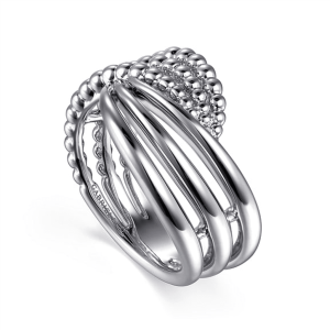 Contemporary silver ring with intricate design and bead accents for a bold statement.