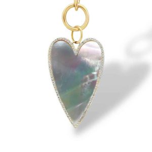 Elegant heart-shaped opalescent pendant with sparkling stones, perfect for gifts and special occasions.