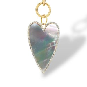 Elegant heart-shaped pendant with iridescent mother-of-pearl and gold-toned embellishments.