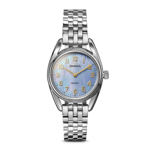 Stylish Shinola wristwatch with a light blue dial and elegant silver stainless steel bracelet.