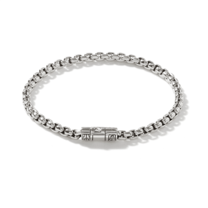Stylish silver bracelet with intricate interlocking links and a unique clasp design.